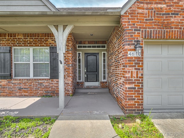 4610 E 142nd St S, Bixby, OK 74008 - doorway to property with brick siding and a garage