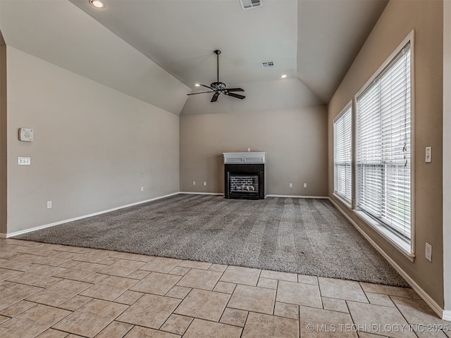 4610 E 142nd St S, Bixby, OK 74008 - unfurnished living room featuring ceiling fan, a glass covered fireplace, light carpet, lofted ceiling, and recessed lighting