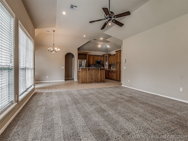 4610 E 142nd St S, Bixby, OK 74008 - unfurnished living room featuring a ceiling fan, arched walkways, light colored carpet, a chandelier, and recessed lighting