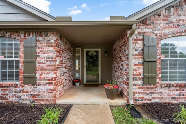 5202 Greenan Dr, Sand Springs, OK 74063 - property entrance featuring brick siding