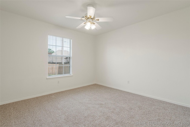 5202 Greenan Dr, Sand Springs, OK 74063 - carpeted spare room featuring baseboards and ceiling fan
