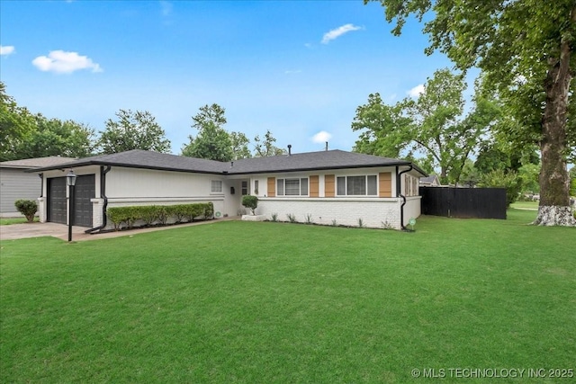 1008 E 54th St S, Tulsa, OK 74105 - view of front of house with driveway and a garage