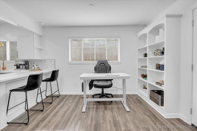 1008 E 54th St S, Tulsa, OK 74105 - home office featuring light wood-style flooring and baseboards