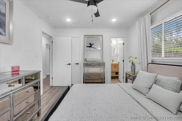 1008 E 54th St S, Tulsa, OK 74105 - bedroom with wood finished floors, recessed lighting, crown molding, connected bathroom, and ceiling fan