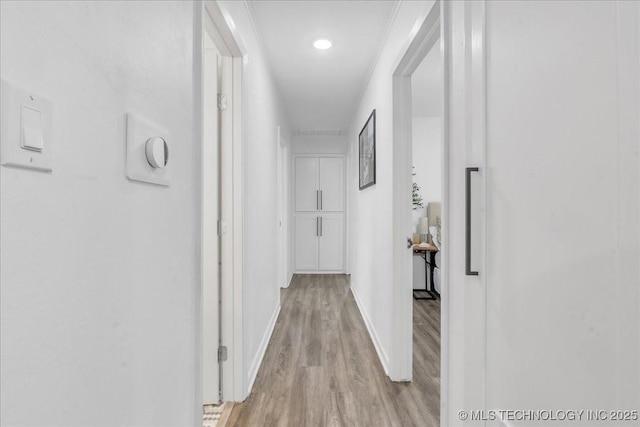 1008 E 54th St S, Tulsa, OK 74105 - corridor featuring wood finished floors, baseboards, and recessed lighting