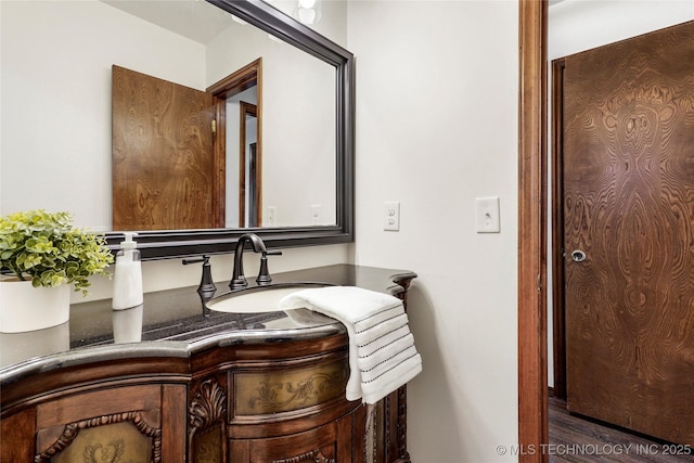 911 S Boyd Pl, Sapulpa, OK 74066 - bathroom featuring vanity and wood finished floors