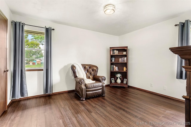 911 S Boyd Pl, Sapulpa, OK 74066 - living area with dark wood-style flooring and baseboards