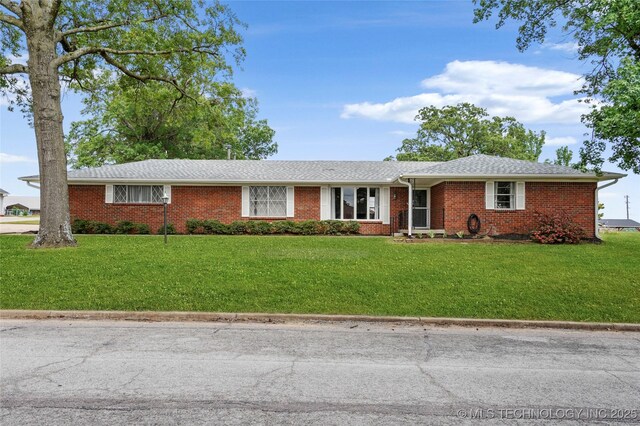 911 S Boyd Pl, Sapulpa, OK 74066 - ranch-style home with a front lawn and brick siding