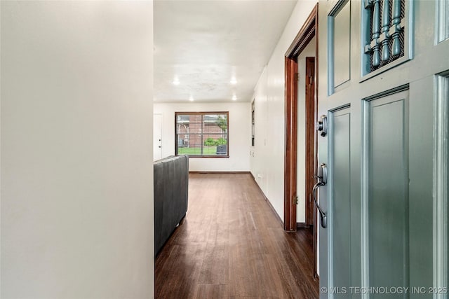 911 S Boyd Pl, Sapulpa, OK 74066 - hallway with dark wood finished floors and baseboards