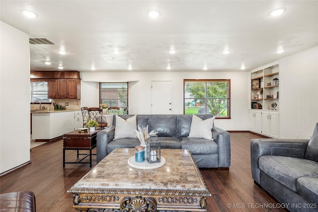911 S Boyd Pl, Sapulpa, OK 74066 - living room featuring dark wood finished floors, recessed lighting, and baseboards