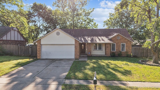 9703 N 109th E Ave, Owasso, OK 74055 - view of front facade featuring brick siding, a garage, and driveway