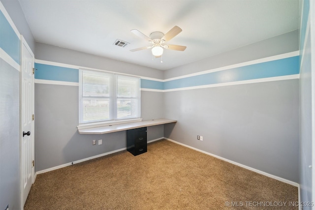 9703 N 109th E Ave, Owasso, OK 74055 - unfurnished office featuring built in study area, a ceiling fan, carpet floors, and baseboards