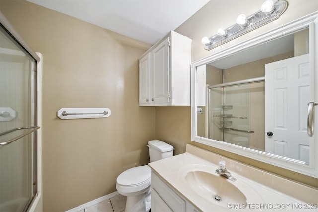 9703 N 109th E Ave, Owasso, OK 74055 - bathroom with a shower with shower door, toilet, vanity, and tile patterned flooring