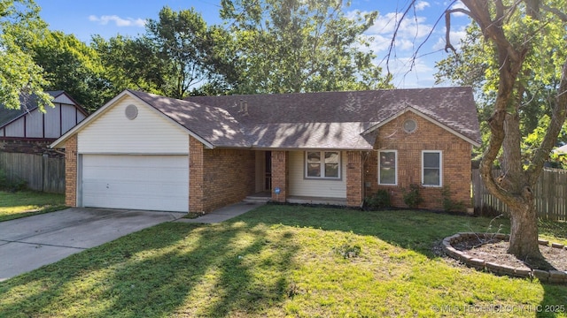 9703 N 109th E Ave, Owasso, OK 74055 - tudor-style house featuring brick siding, a garage, concrete driveway, and roof with shingles