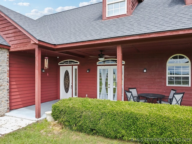 5757 W 181st St S, Mounds, OK 74047 - view of exterior entry featuring french doors, roof with shingles, and ceiling fan