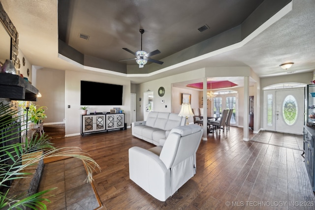 5757 W 181st St S, Mounds, OK 74047 - living room with a ceiling fan, a raised ceiling, and wood finished floors