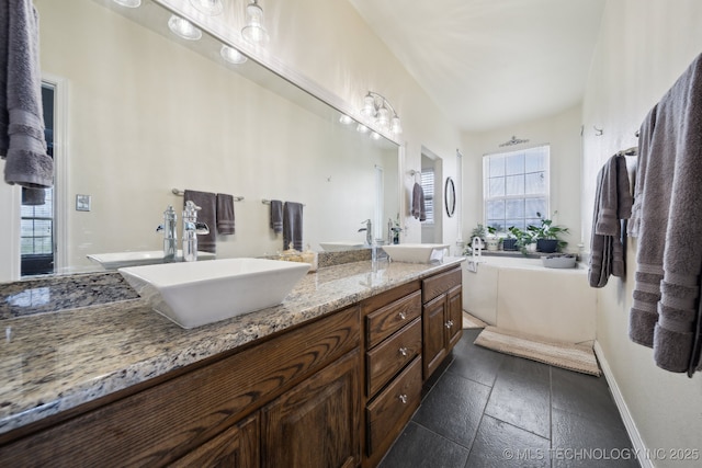 5757 W 181st St S, Mounds, OK 74047 - full bathroom featuring a soaking tub and double vanity