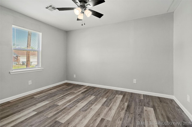 821 N 71st E Ave, Tulsa, OK 74115 - unfurnished room featuring wood finished floors, baseboards, and ceiling fan