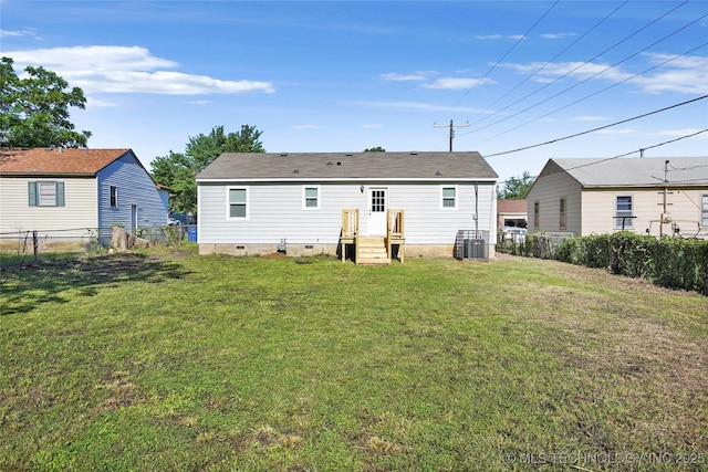 821 N 71st E Ave, Tulsa, OK 74115 - rear view of house with central AC
