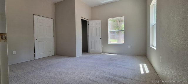 510 S Madison Ave, Wagoner, OK 74467 - unfurnished bedroom with carpet flooring