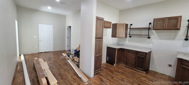 510 S Madison Ave, Wagoner, OK 74467 - kitchen with dark wood-type flooring