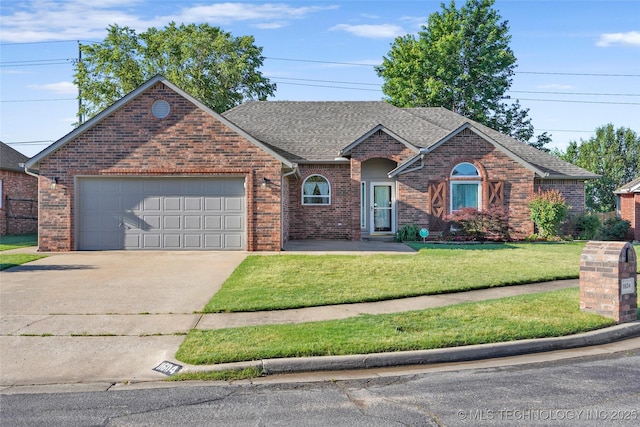 11604 E 99th St, Owasso, OK 74055 - traditional home with brick siding, an attached garage, roof with shingles, driveway, and a front lawn