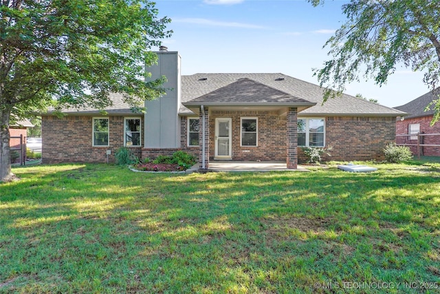 11604 E 99th St, Owasso, OK 74055 - rear view of house featuring brick siding, a chimney, a patio, and a shingled roof