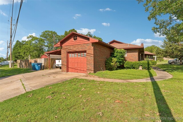 1401 E S Ave, Mcalester, OK 74501 - ranch-style house featuring brick siding, a carport, driveway, an attached garage, and a chimney