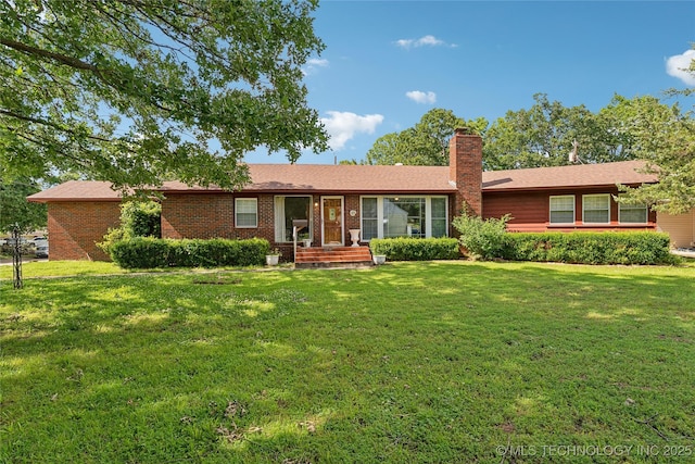 1401 E S Ave, Mcalester, OK 74501 - ranch-style home featuring a front lawn, a chimney, and brick siding