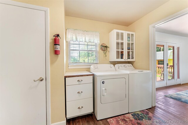 1401 E S Ave, Mcalester, OK 74501 - laundry area with washing machine and clothes dryer, dark wood-type flooring, plenty of natural light, and baseboards