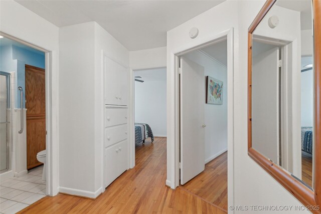1401 E S Ave, Mcalester, OK 74501 - corridor with light wood-style floors and baseboards