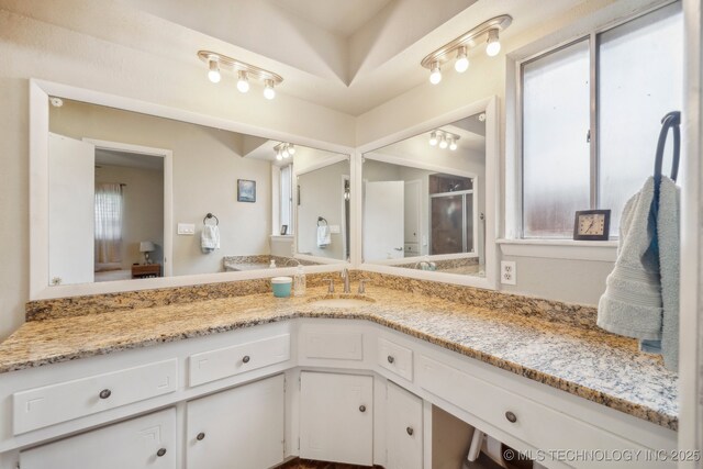 5212 S 68th E Pl, Tulsa, OK 74145 - bathroom with vanity and an enclosed shower