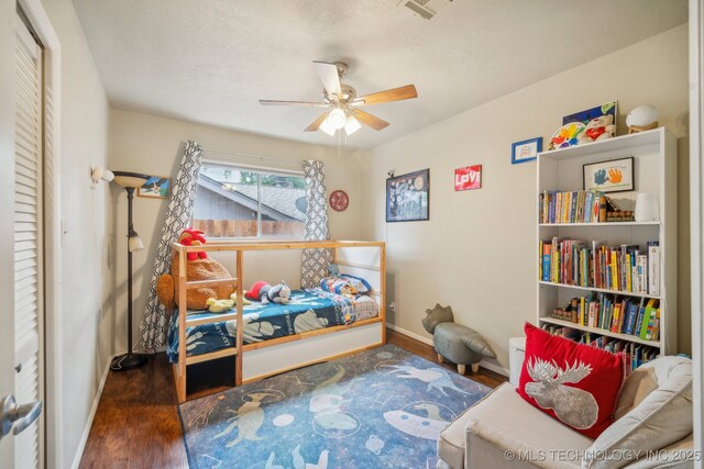 5212 S 68th E Pl, Tulsa, OK 74145 - bedroom featuring wood finished floors, baseboards, and a ceiling fan