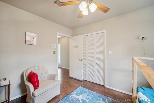 5212 S 68th E Pl, Tulsa, OK 74145 - living area featuring ceiling fan, wood finished floors, and baseboards