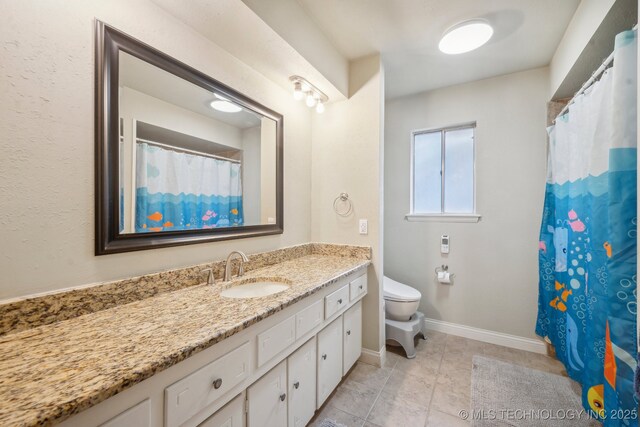 5212 S 68th E Pl, Tulsa, OK 74145 - full bathroom with toilet, vanity, baseboards, tile patterned floors, and a shower with shower curtain