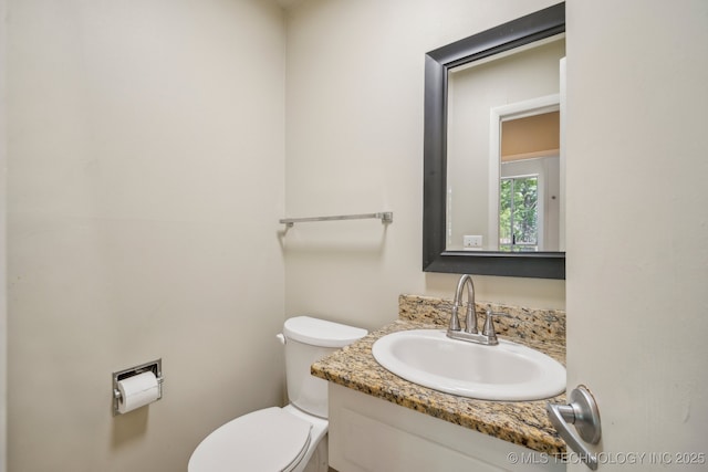5212 S 68th E Pl, Tulsa, OK 74145 - half bathroom featuring toilet and vanity