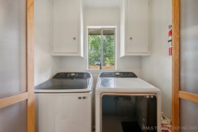 5212 S 68th E Pl, Tulsa, OK 74145 - washroom featuring cabinet space and washer and dryer
