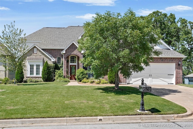 465 E 113th St S, Jenks, OK 74037 - french country style house with a shingled roof, driveway, brick siding, and a front yard