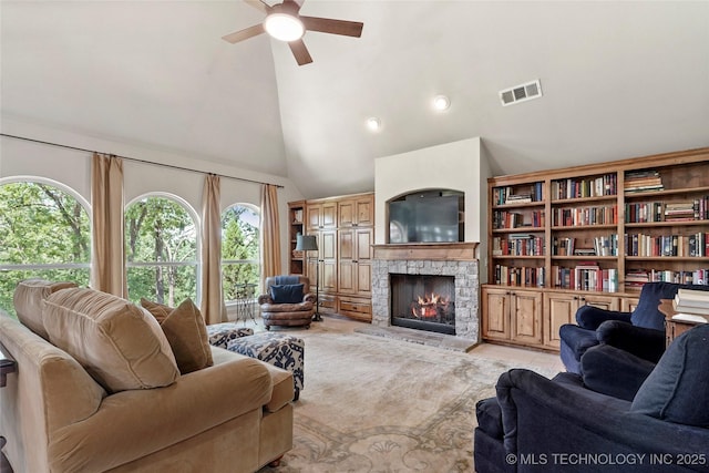 465 E 113th St S, Jenks, OK 74037 - living room with ceiling fan, a stone fireplace, high vaulted ceiling, and recessed lighting