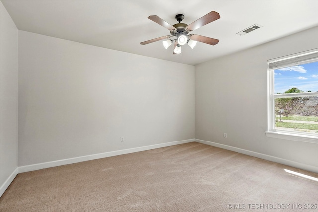 465 E 113th St S, Jenks, OK 74037 - empty room featuring light colored carpet, baseboards, and a ceiling fan