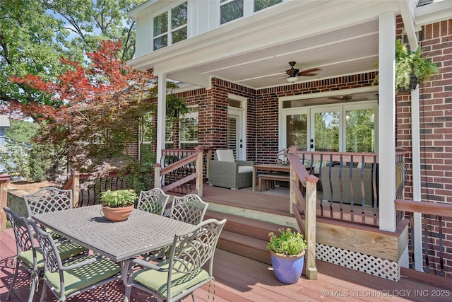 465 E 113th St S, Jenks, OK 74037 - wooden deck with outdoor dining space, ceiling fan, and french doors