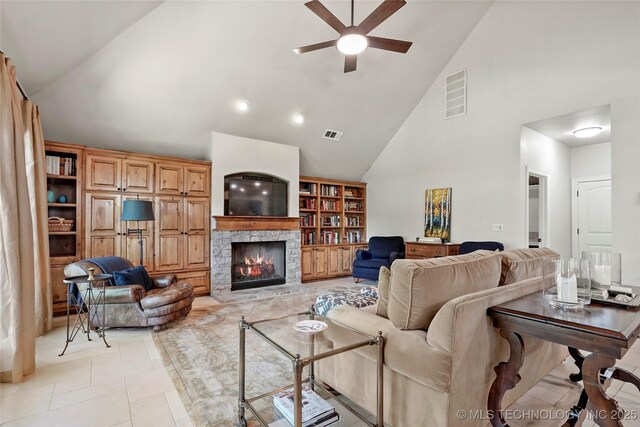 465 E 113th St S, Jenks, OK 74037 - living room featuring high vaulted ceiling, ceiling fan, a fireplace, and light tile patterned floors