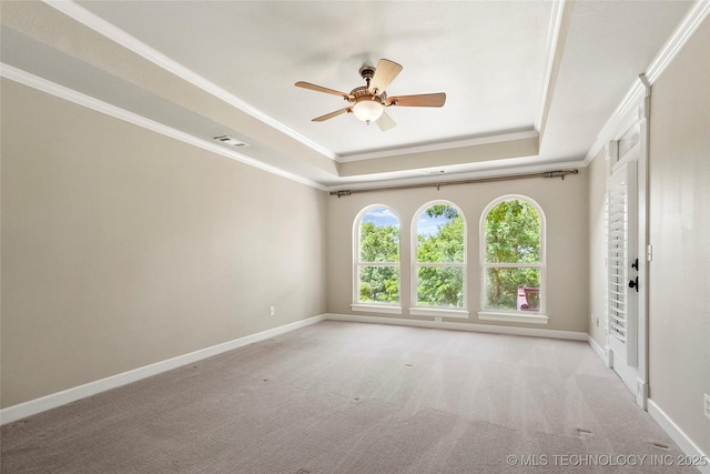 465 E 113th St S, Jenks, OK 74037 - empty room with a raised ceiling, ornamental molding, a ceiling fan, baseboards, and light carpet