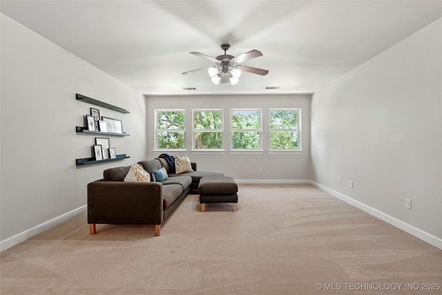465 E 113th St S, Jenks, OK 74037 - living room with baseboards, light carpet, and a ceiling fan