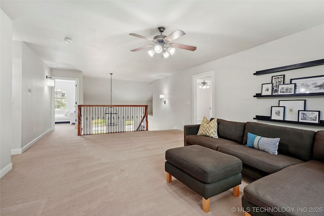 465 E 113th St S, Jenks, OK 74037 - living room featuring a ceiling fan, baseboards, and carpet flooring