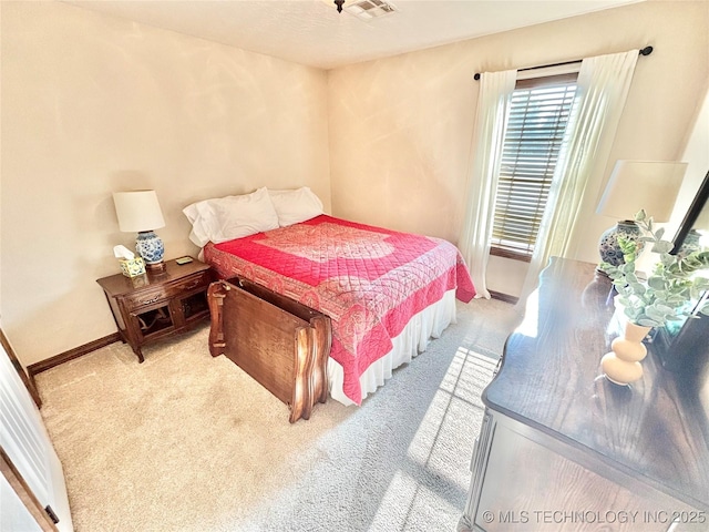 2102 N Peaceful Ln, Stigler, OK 74462 - carpeted bedroom with baseboards