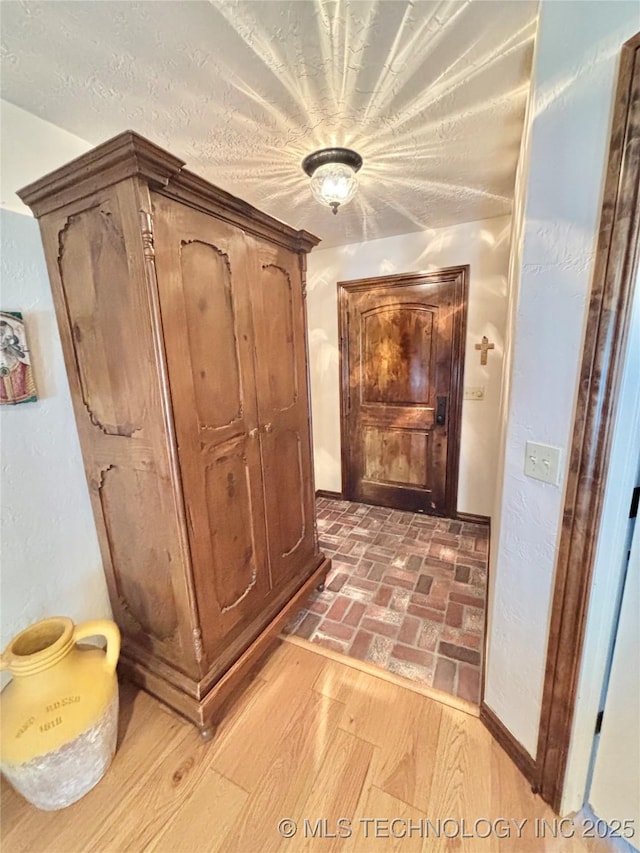 2102 N Peaceful Ln, Stigler, OK 74462 - hall with light wood-style floors