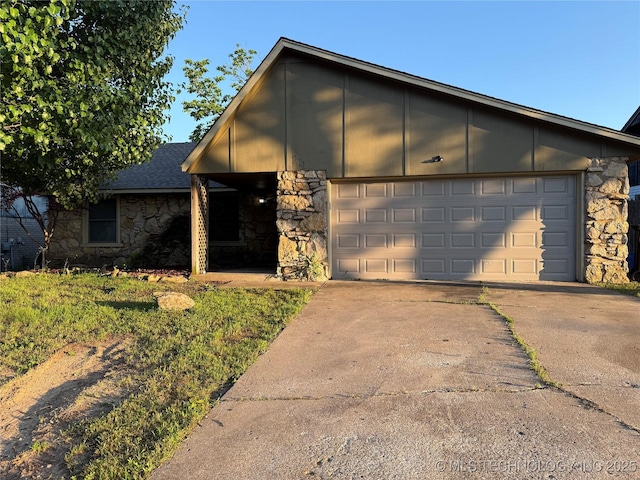 211 E Waco Pl, Broken Arrow, OK 74011 - mid-century inspired home with stone siding, concrete driveway, and an attached garage