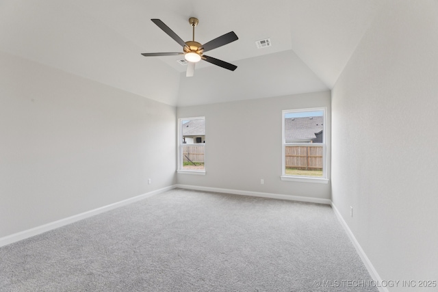 22832 E 106th Pl S, Broken Arrow, OK 74014 - empty room featuring healthy amount of natural light, carpet, ceiling fan, and vaulted ceiling