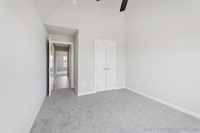 22832 E 106th Pl S, Broken Arrow, OK 74014 - unfurnished bedroom with carpet flooring, ceiling fan, a closet, and vaulted ceiling